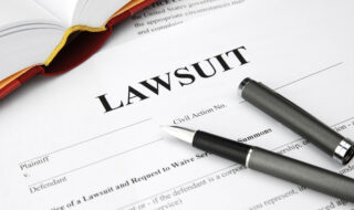 lawsuit form with filler and book