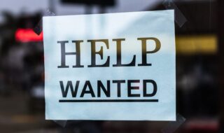 Help wanted jobs sign royalty free from Unsplash