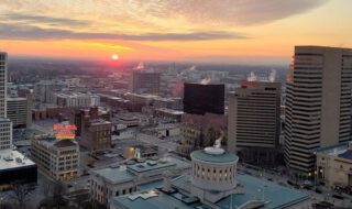 Arial view of the Ohio Legislative building at sunset