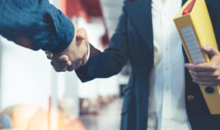 Business people shaking hands